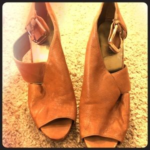 Tan open toe wide heel shoes with ankle strap